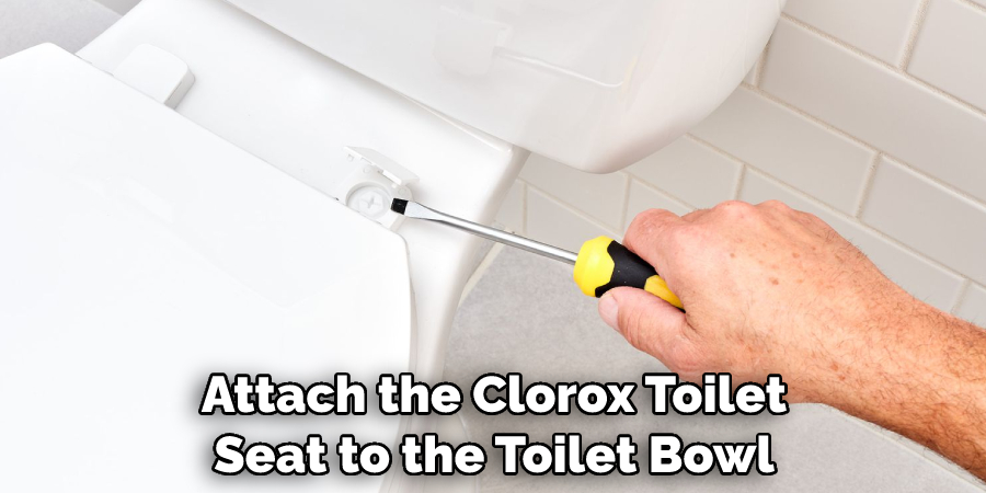 Attach the Clorox Toilet Seat to the Toilet Bowl