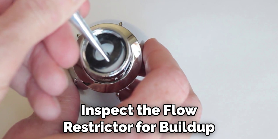 Inspect the Flow Restrictor for Buildup