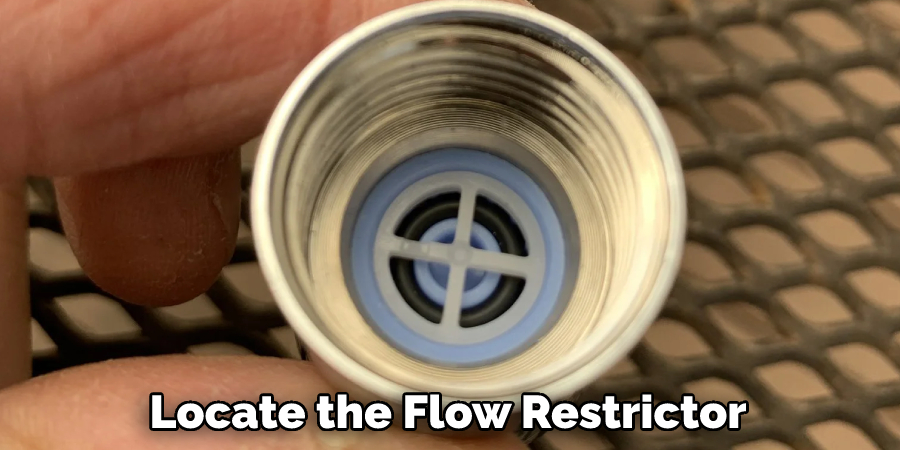 Locate the Flow Restrictor