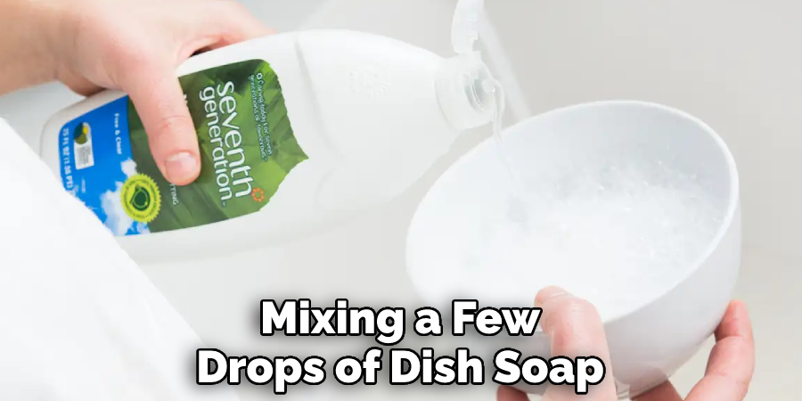 Mixing a Few Drops of Dish Soap