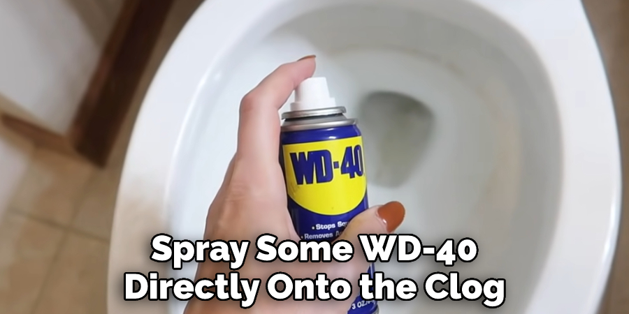Spray Some WD-40 Directly Onto the Clog