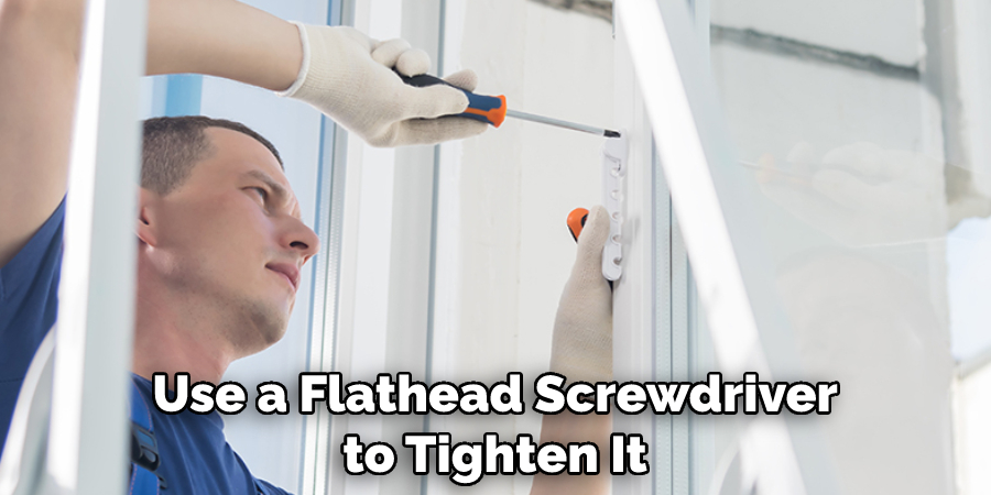 Use a Flathead Screwdriver to Tighten It