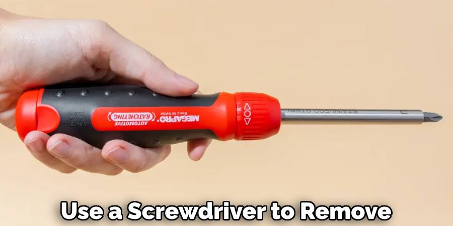 Use a Screwdriver to Remove