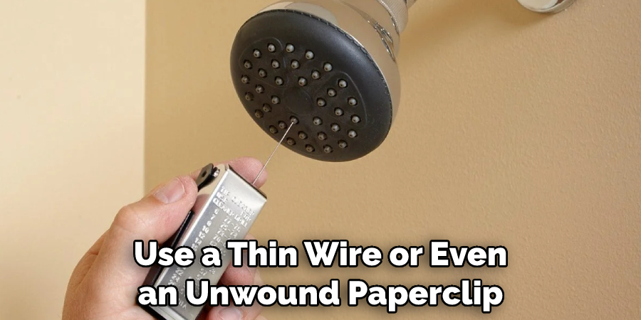 Use a Thin Wire or Even an Unwound Paperclip