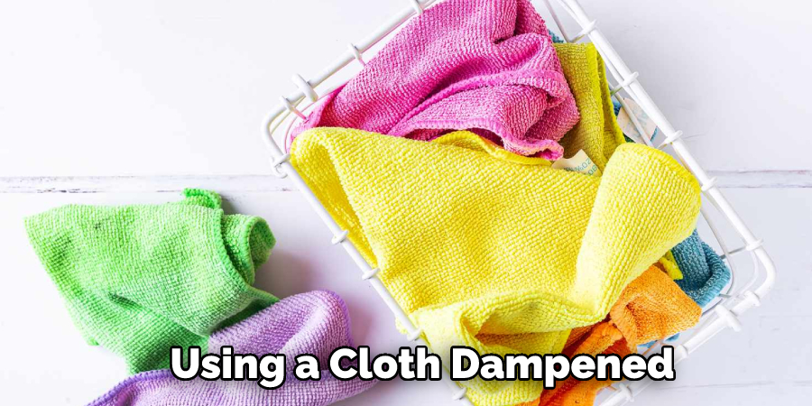 Using a Cloth Dampened