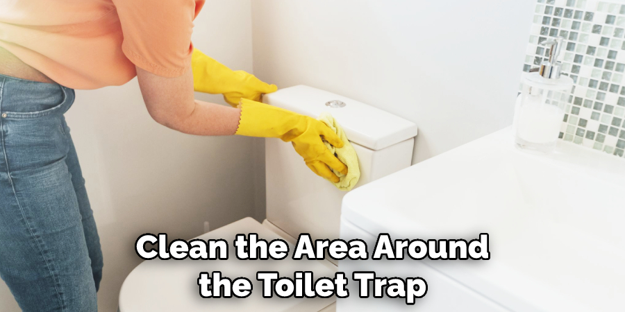 Clean the Area Around the Toilet Trap