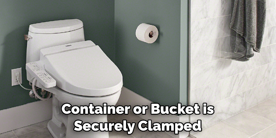 Container or Bucket is Securely Clamped