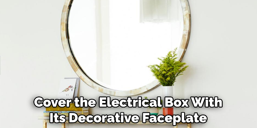 Cover the Electrical Box With Its Decorative Faceplate