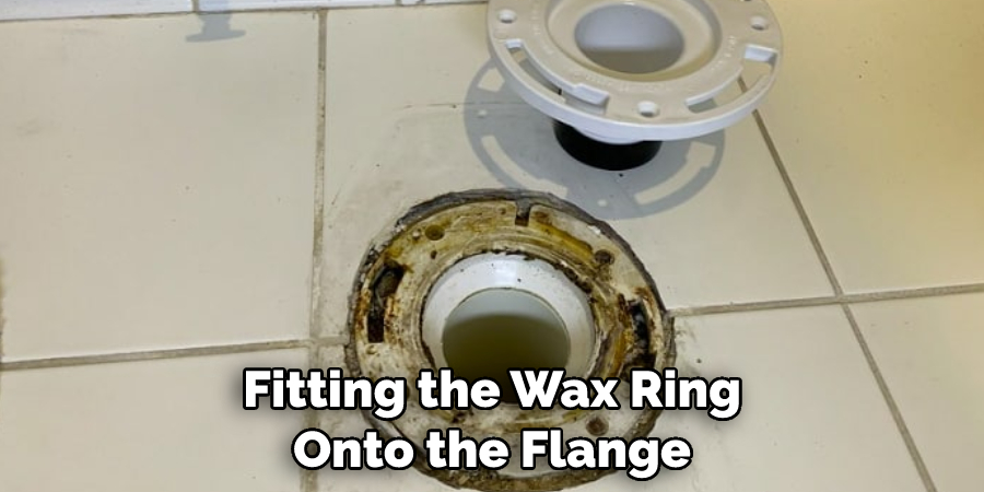 Fitting the Wax Ring Onto the Flange