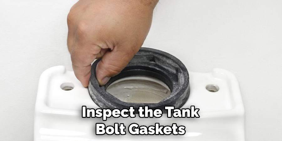 Inspect the Tank Bolt Gaskets