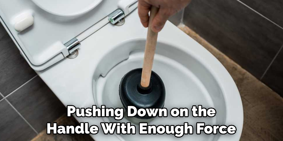 Pushing Down on the Handle With Enough Force