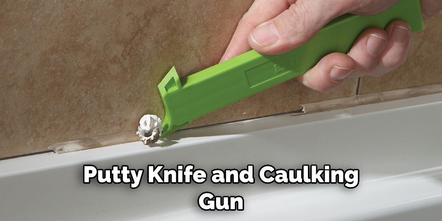 Putty Knife and Caulking Gun