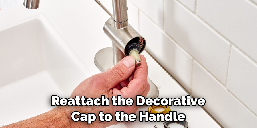 Reattach the Decorative Cap to the Handle