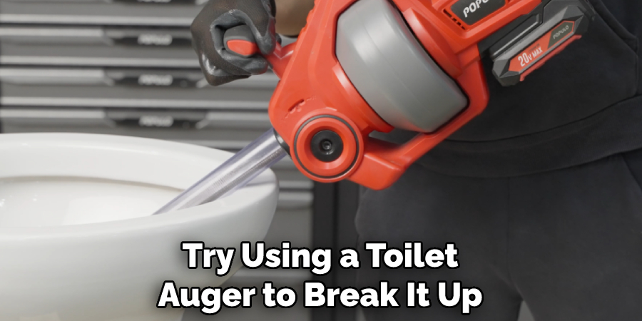 Try Using a Toilet Auger to Break It Up