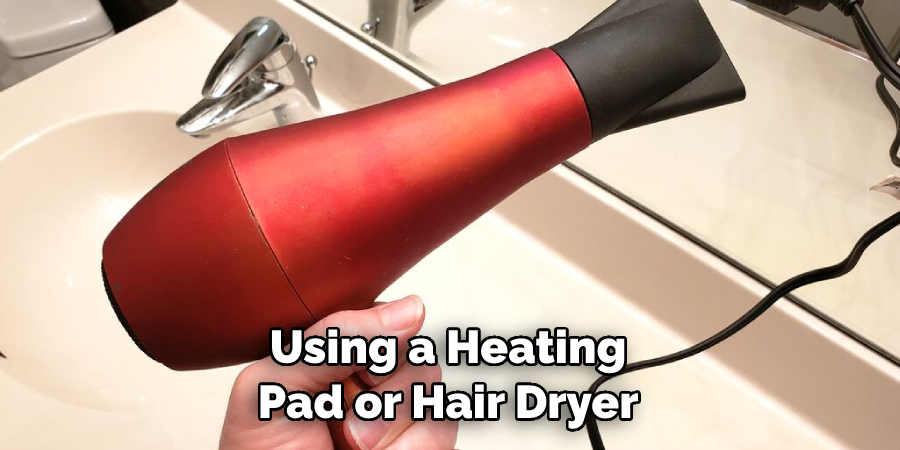 Using a Heating Pad or Hair Dryer