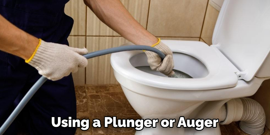 Using a Plunger or Auger