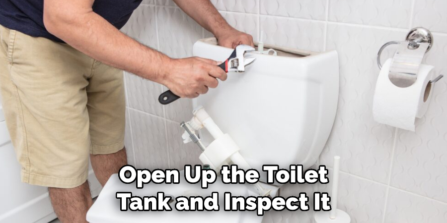 Open Up the Toilet Tank and Inspect It