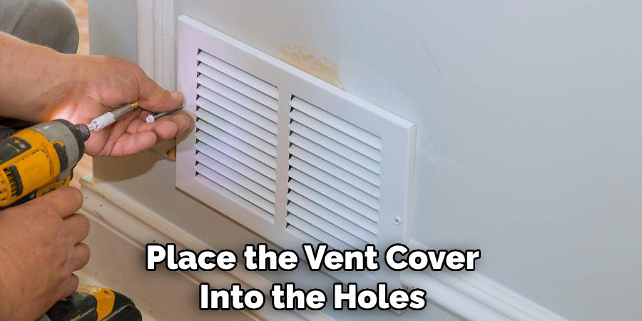 Place the Vent Cover Into the Holes