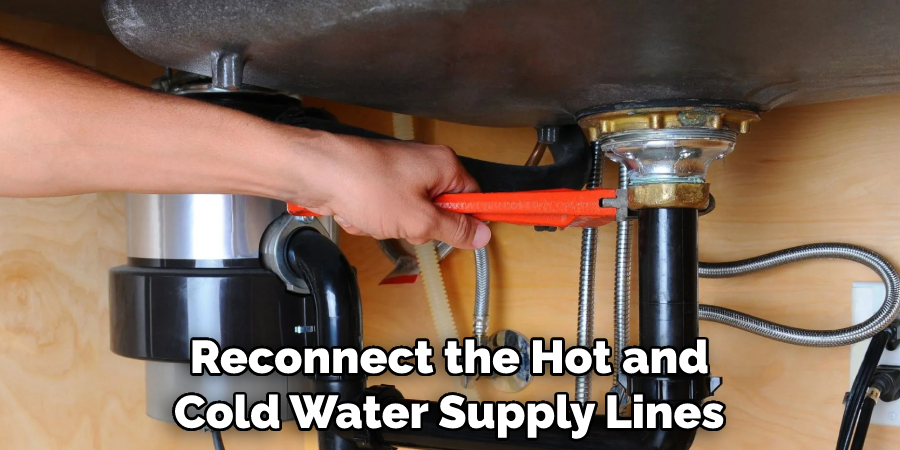 Reconnect the Hot and Cold Water Supply Lines