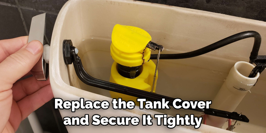 Replace the Tank Cover and Secure It Tightly