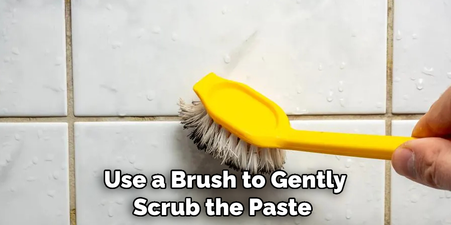 Use a Brush to Gently Scrub the Paste 