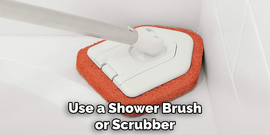 Use a Shower Brush or Scrubber