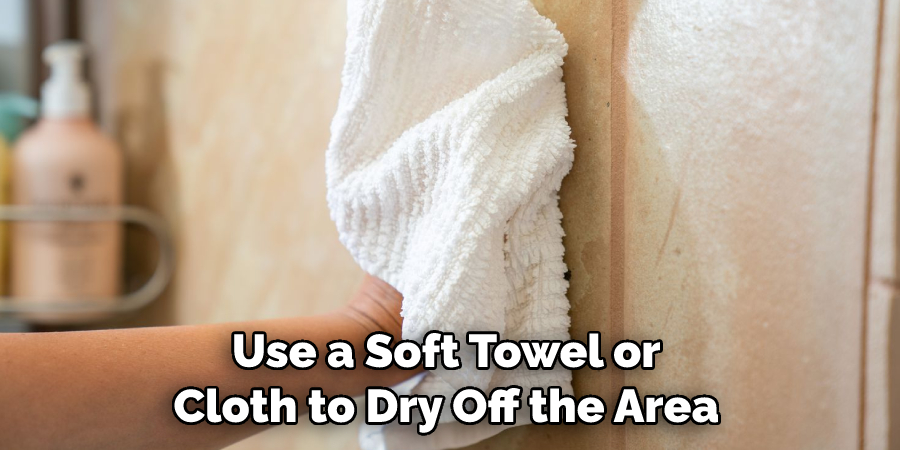 Use a Soft Towel or Cloth to Dry Off the Area