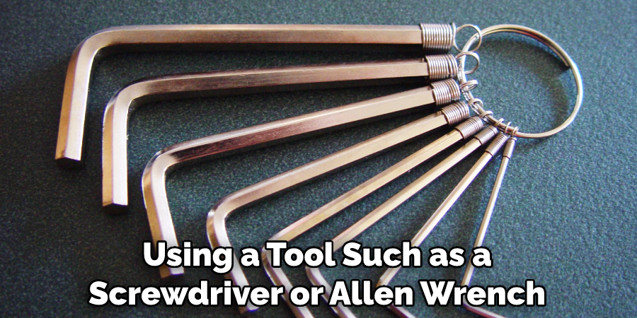 Using a Tool Such as a Screwdriver or Allen Wrench