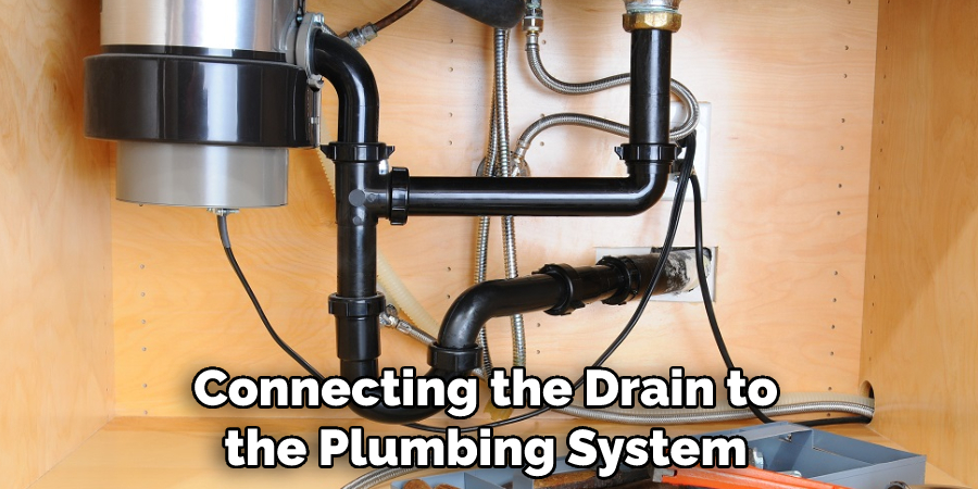 Connecting the Drain to the Plumbing System