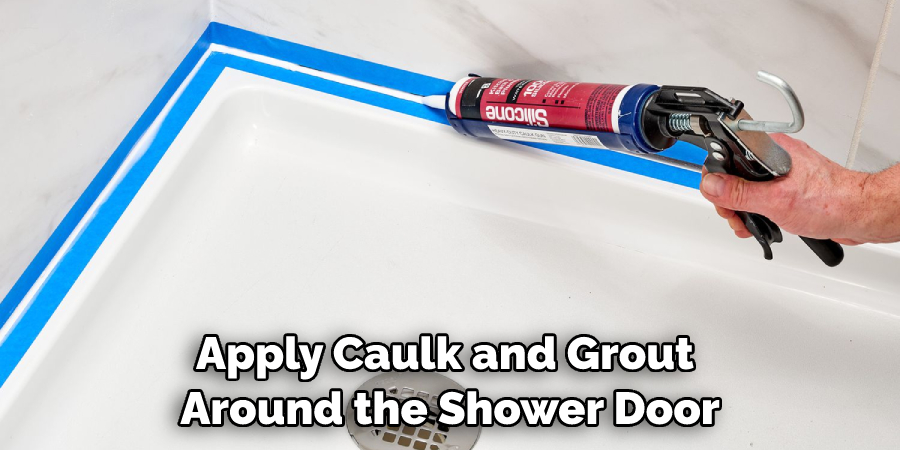 Apply Caulk and Grout Around the Shower Door