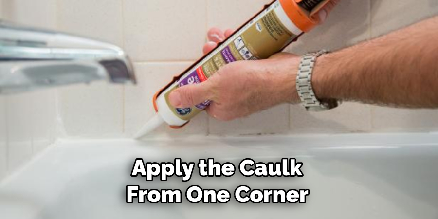 Apply the Caulk From One Corner 