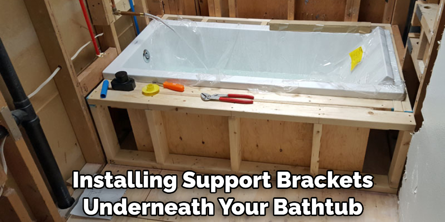 Installing Support Brackets Underneath Your Bathtub