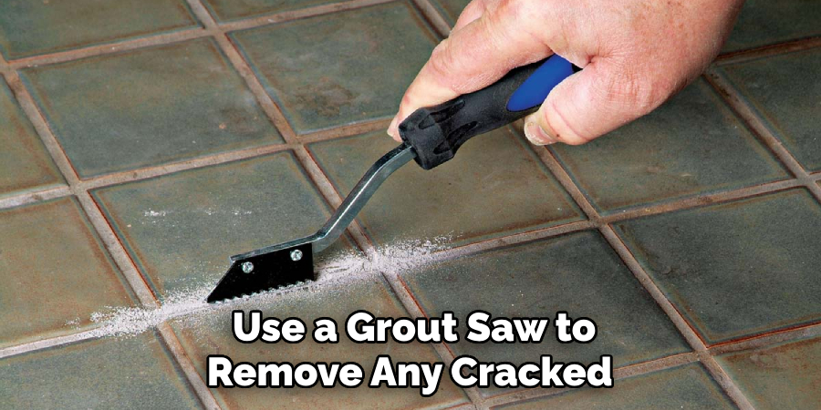 Use a Grout Saw to Remove Any Cracked 