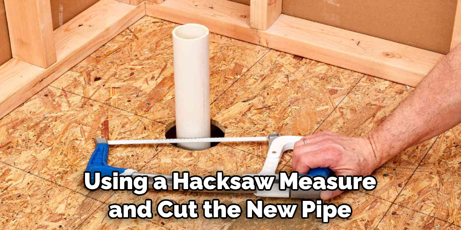 Using a Hacksaw Measure and Cut the New Pipe