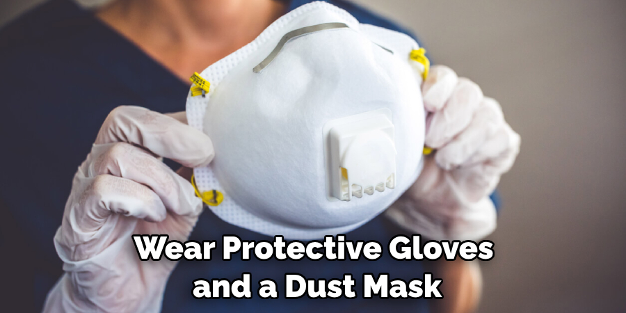 Wear Protective Gloves and a Dust Mask