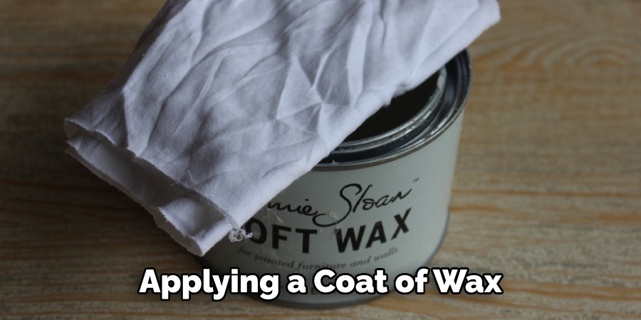 Applying a coat of wax