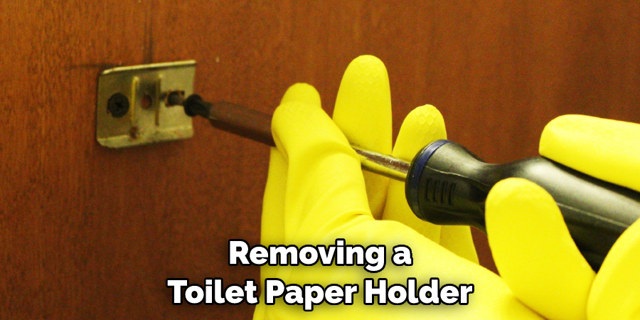 Removing a Toilet Paper Holder