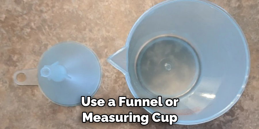 Use a Funnel or Measuring Cup