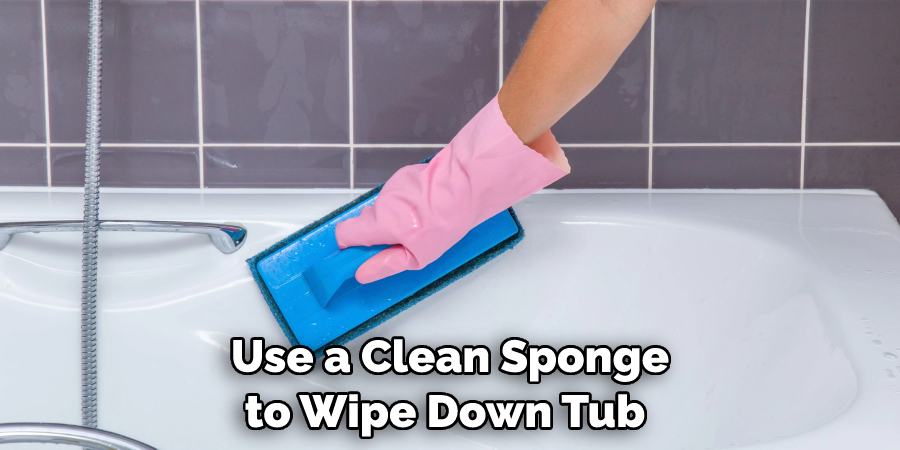 Use a Clean Sponge to Wipe Down Tub 