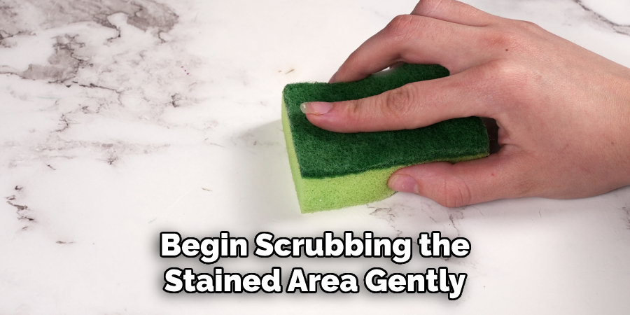 Begin Scrubbing the Stained Area Gently