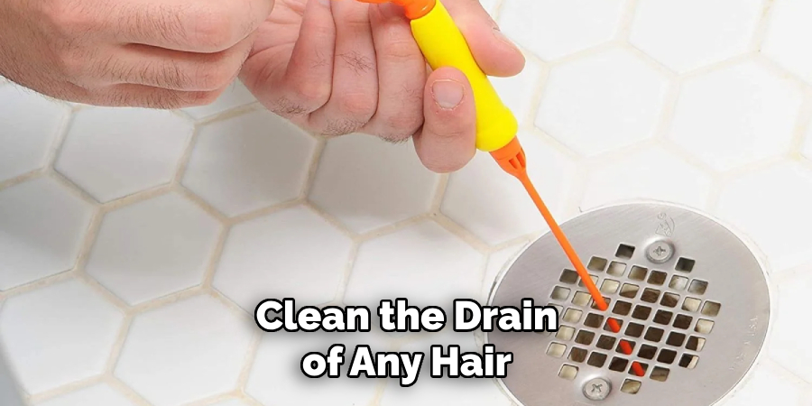 Clean the Drain of Any Hair