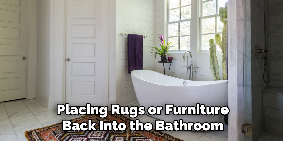 Placing Rugs or Furniture Back Into the Bathroom