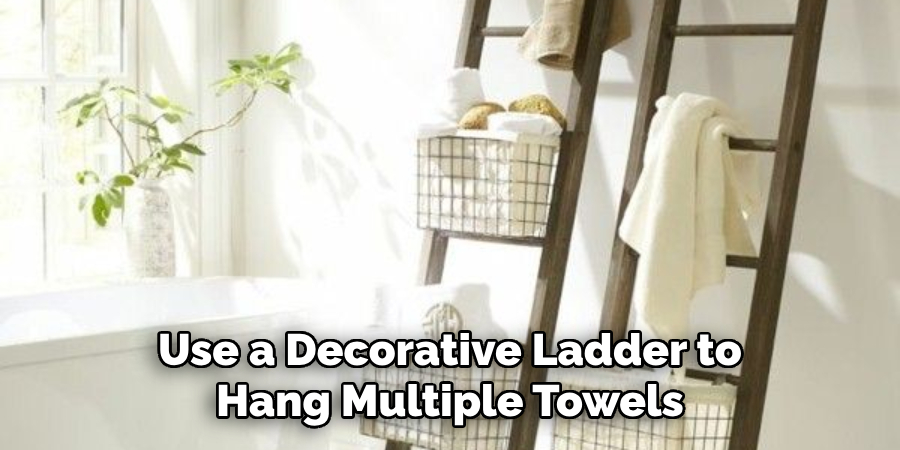 Use a Decorative Ladder to Hang Multiple Towels