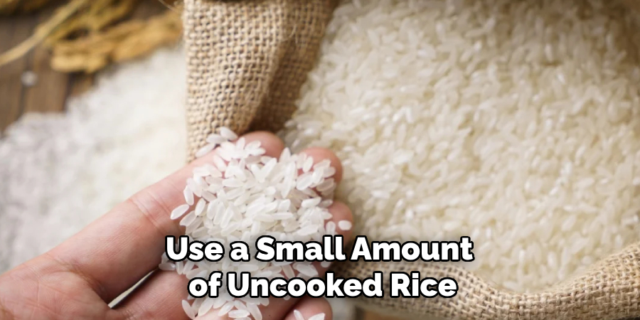 Use a Small Amount of Uncooked Rice