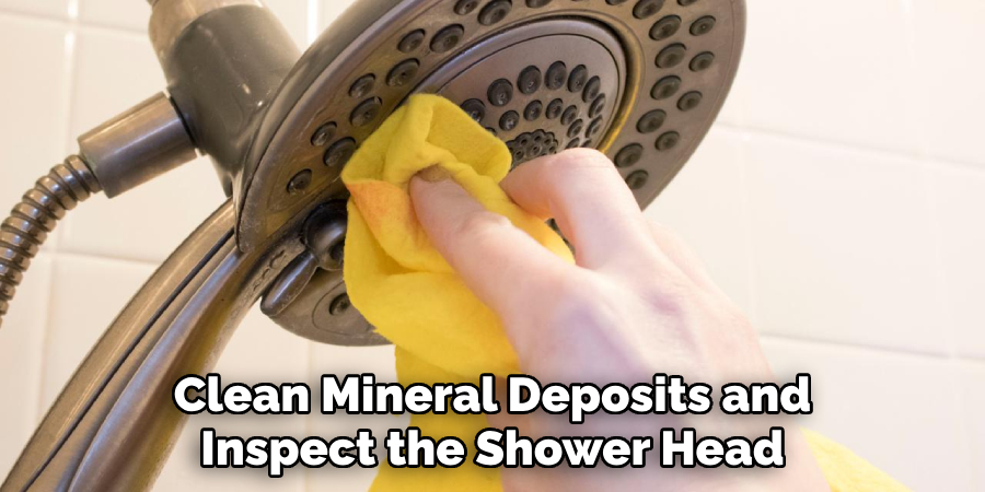 Clean Mineral Deposits and Inspect the Shower Head