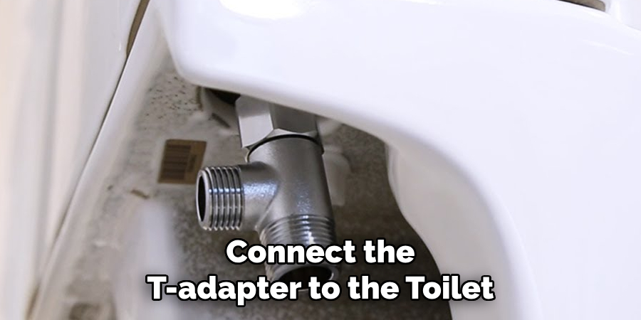 Connect the T-adapter to the Toilet