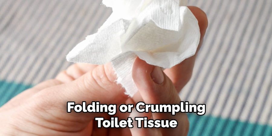 Folding or Crumpling Toilet Tissue