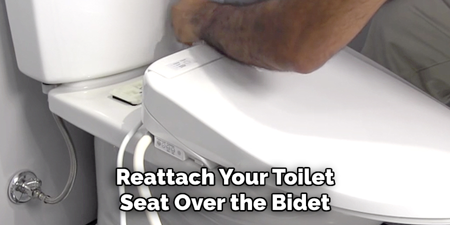 Reattach Your Toilet Seat Over the Bidet