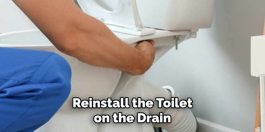 Reinstall the Toilet on the Drain