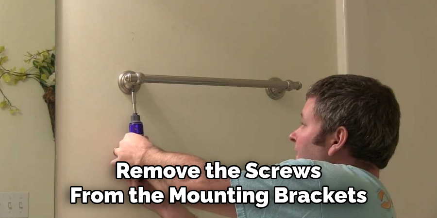 Remove the Screws From the Mounting Brackets